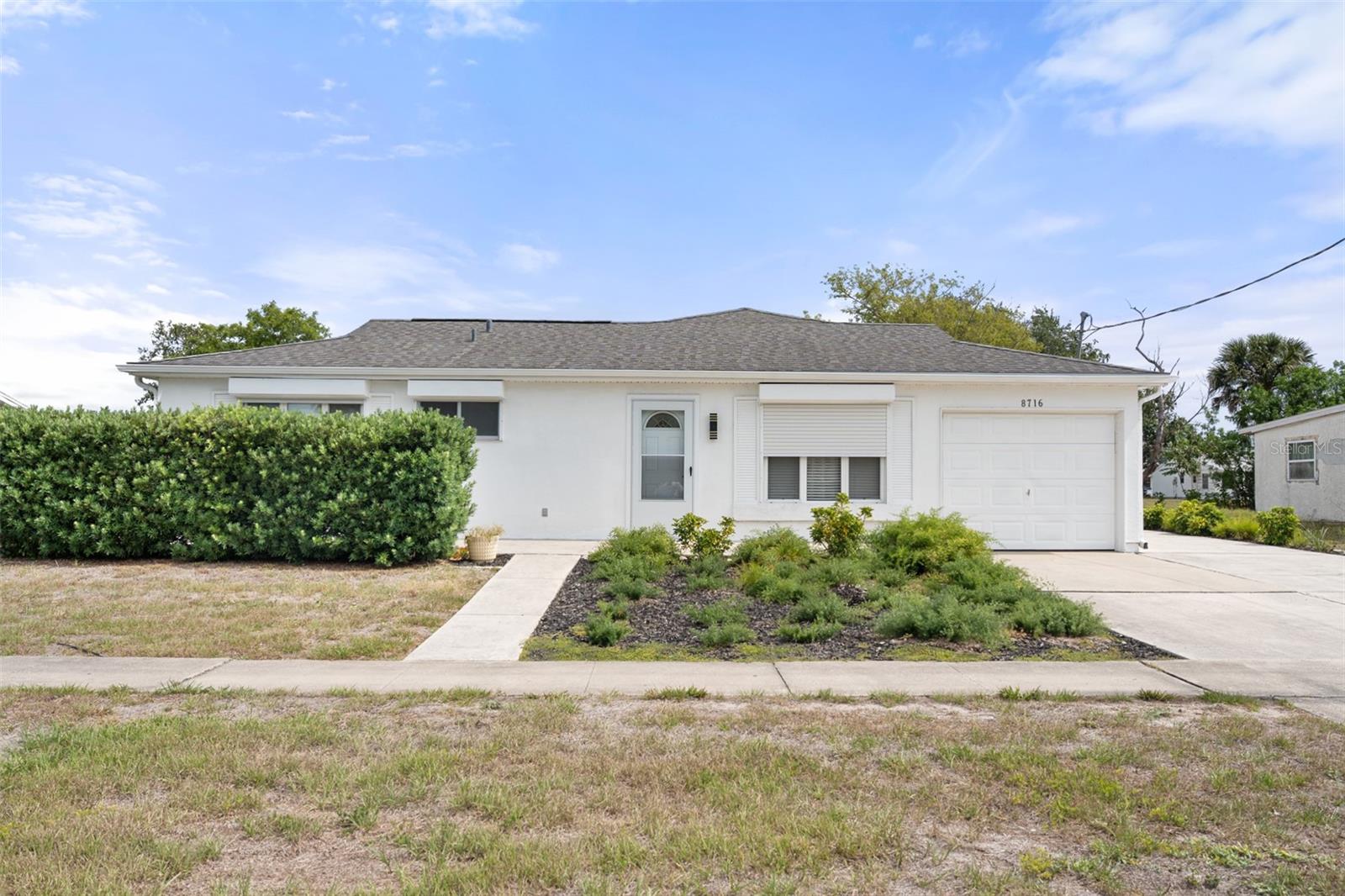 8716 TRIONFO AVE - Photo 1