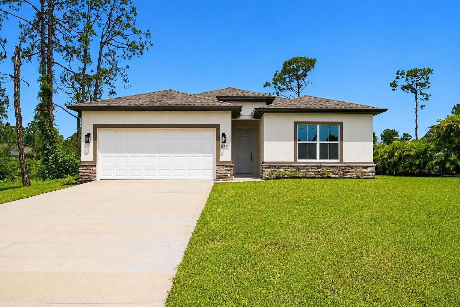 8211 ELKENBERRY AVE - Photo 1