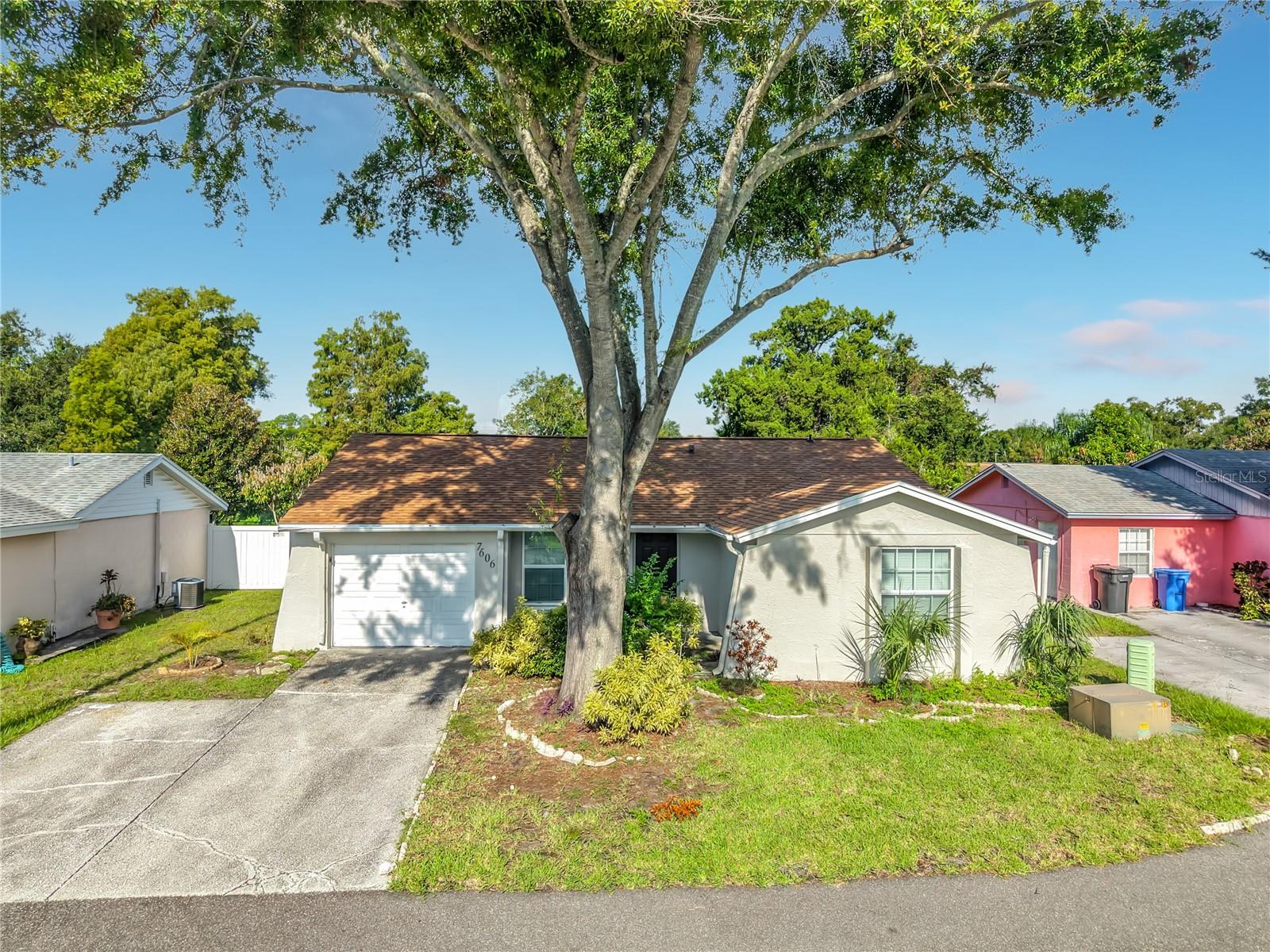 7606 WOODLAND OAKS CT - Photo 1