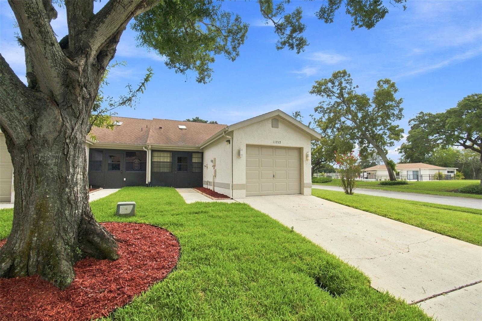 11712 SPRING TREE LN - Photo 1