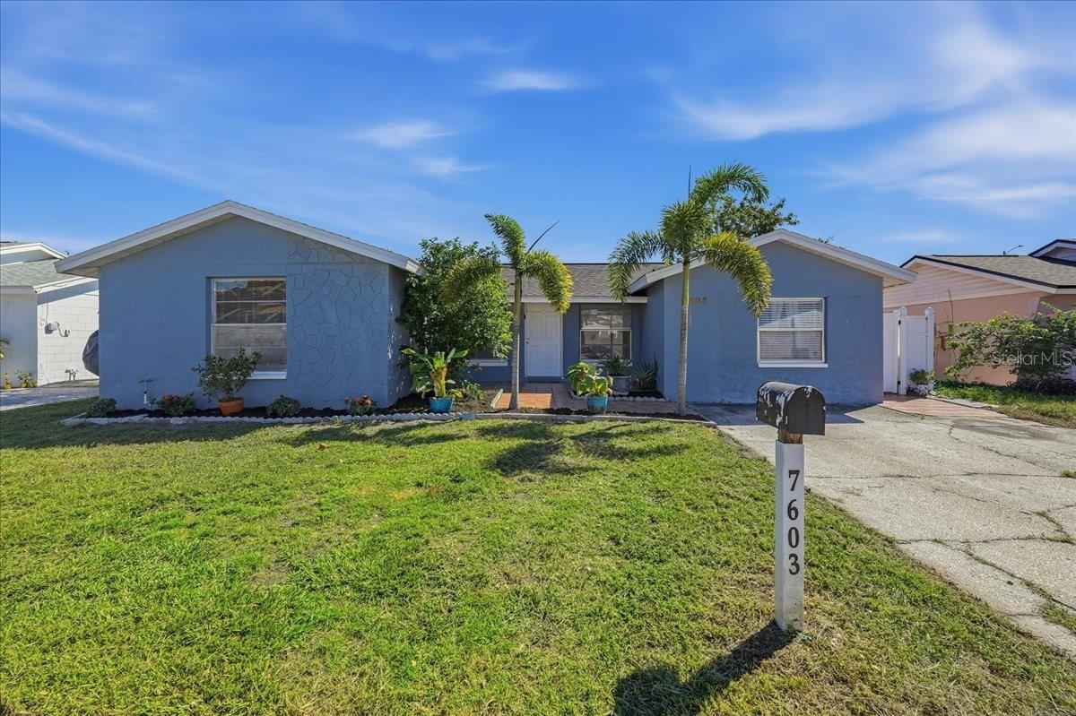 7603 WOODLAND OAKS CT - Photo 1