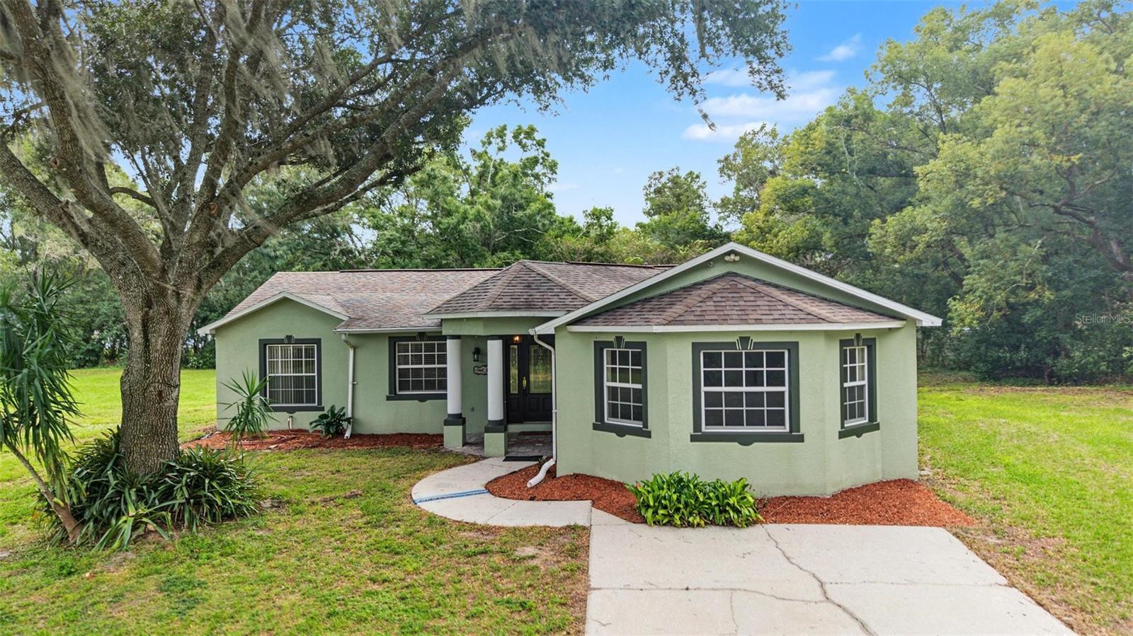 10922 TARPON SPRINGS RD - Photo 1